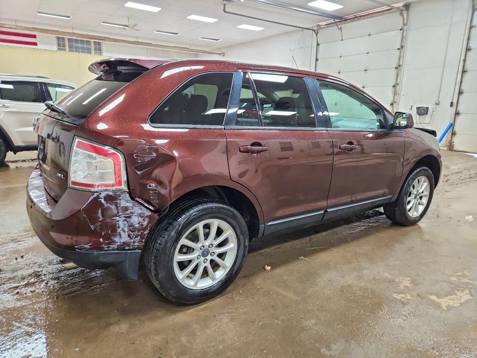 Photo 3 from auction – 2010 FORD EDGE with VIN 2FMDK3JC2ABA31056