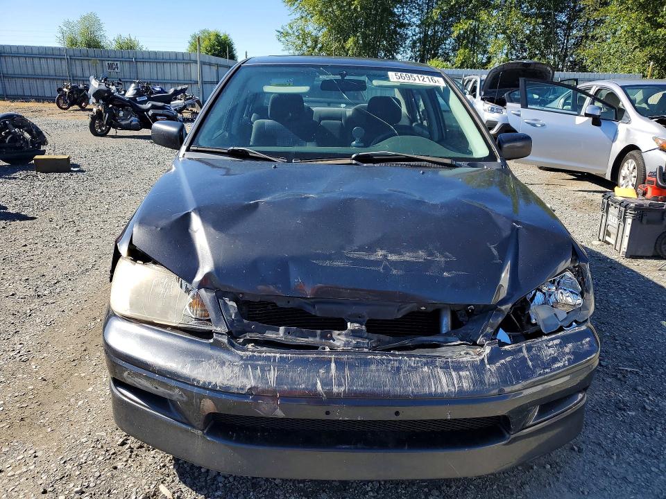 Снимка 5 от търг – 2003 MITSUBISHI LANCER с VIN JA3AJ86EX3U010159