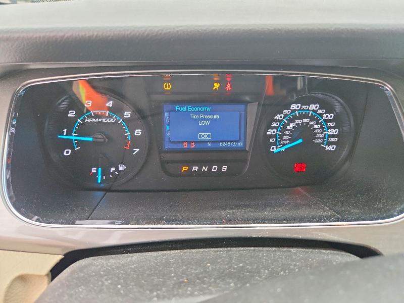 Photo 9 from auction – 2014 FORD TAURUS with VIN 1FAHP2E86EG154564