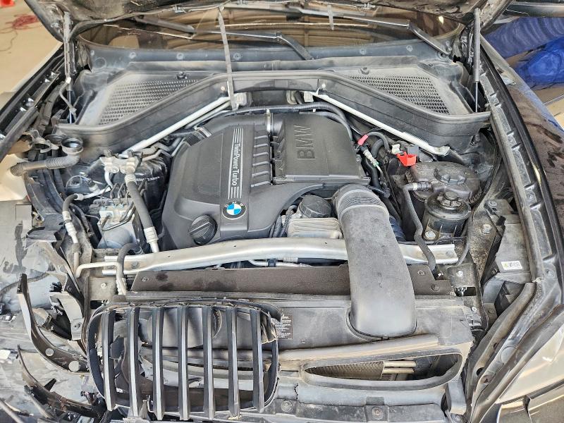 Photo 12 from auction – 2012 BMW X5 with VIN 5UXZV4C55CL748686