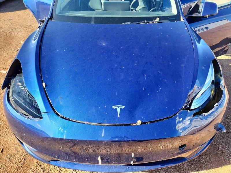 Photo 11 from auction – 2022 TESLA MODEL Y with VIN 7SAYGDEE3NA011075