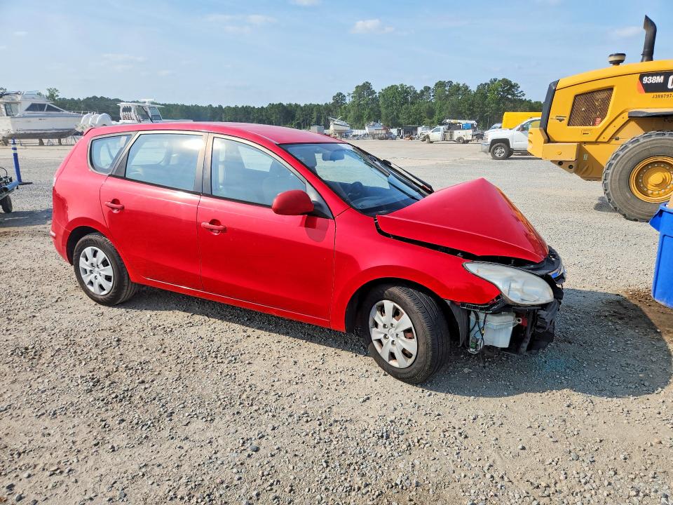 Photo 4 from auction – 2010 HYUNDAI ELANTRA TOURING with VIN KMHDB8AE2AU085529