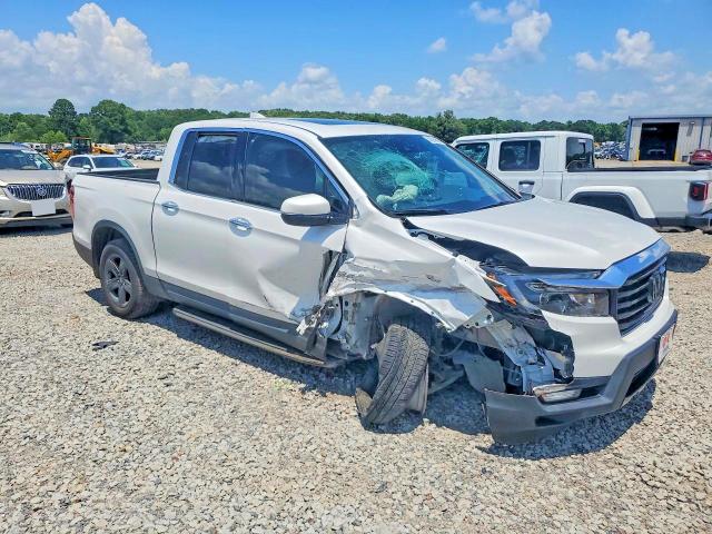 Photo 4 from auction – 2023 HONDA RIDGELINE with VIN 5FPYK3F78PB009258