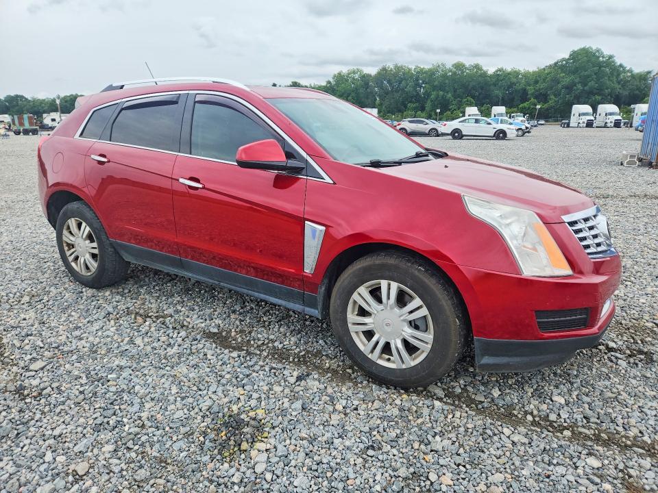 Photo 4 from auction – 2014 CADILLAC SRX with VIN 3GYFNBE35ES633016