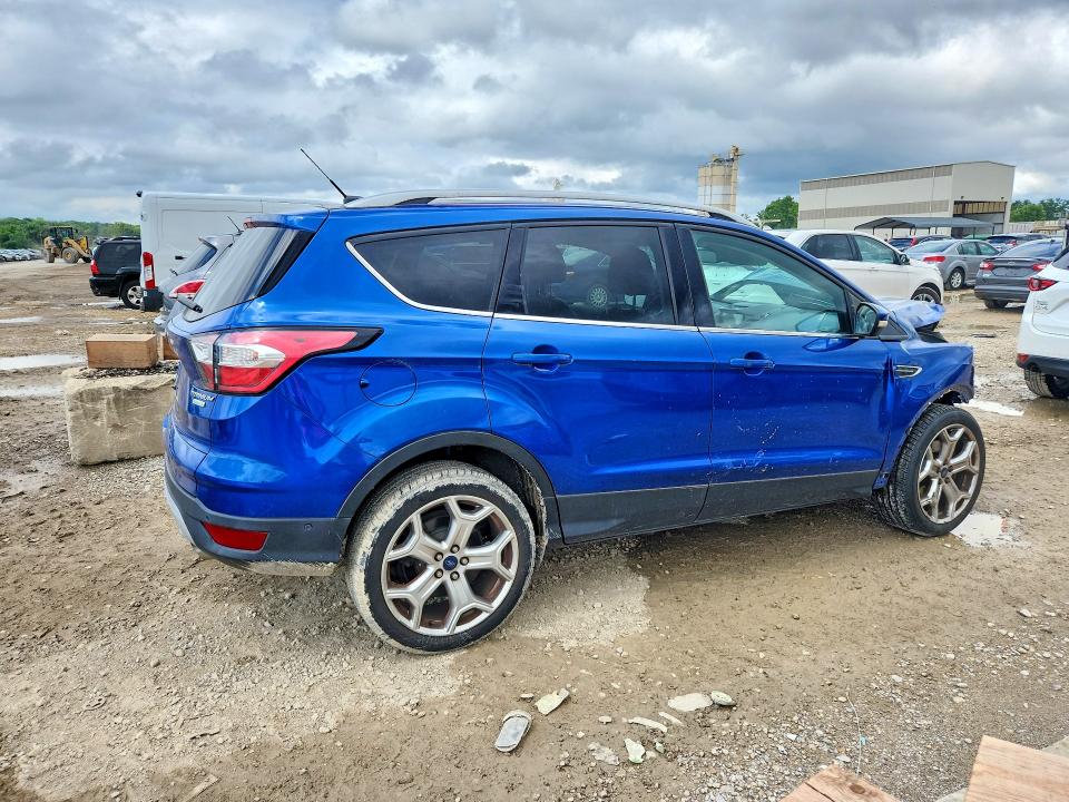 Photo 3 from auction – 2017 FORD ESCAPE with VIN 1FMCU0J9XHUD51044