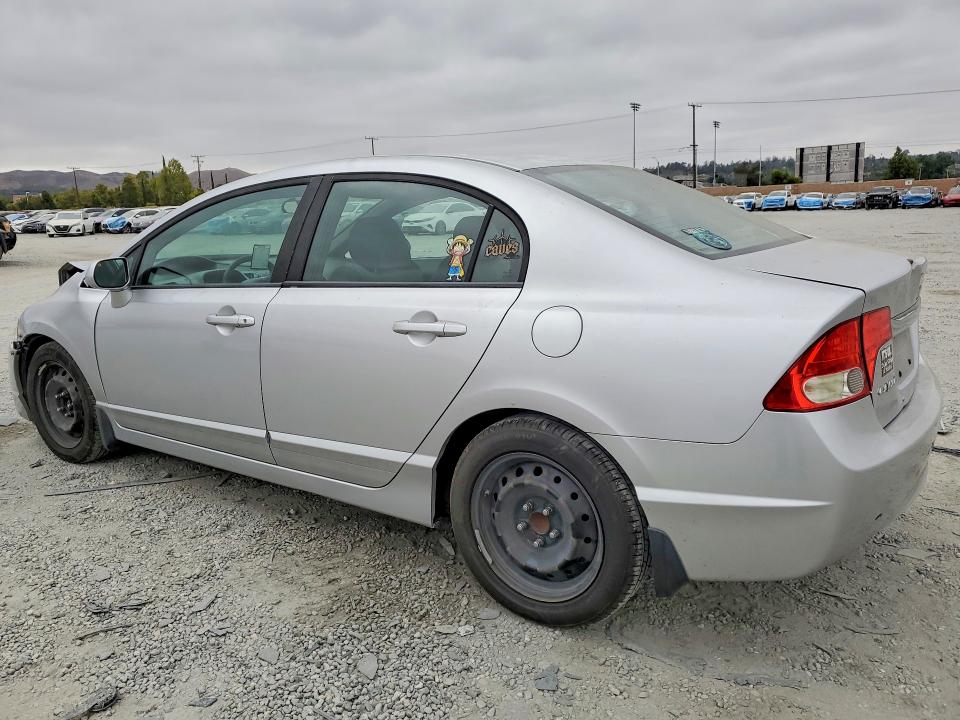 Photo 2 from auction – 2010 HONDA CIVIC with VIN 19XFA1E52AE022947