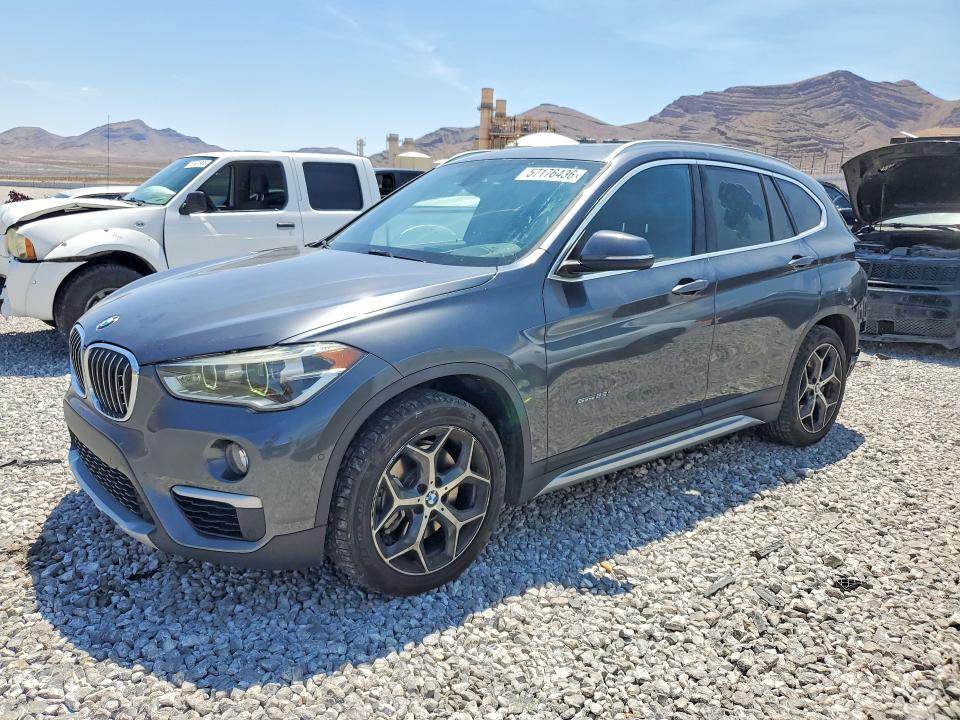 BMW X1 2017 with VIN WBXHU7C39H5H33349 - Photo from auction