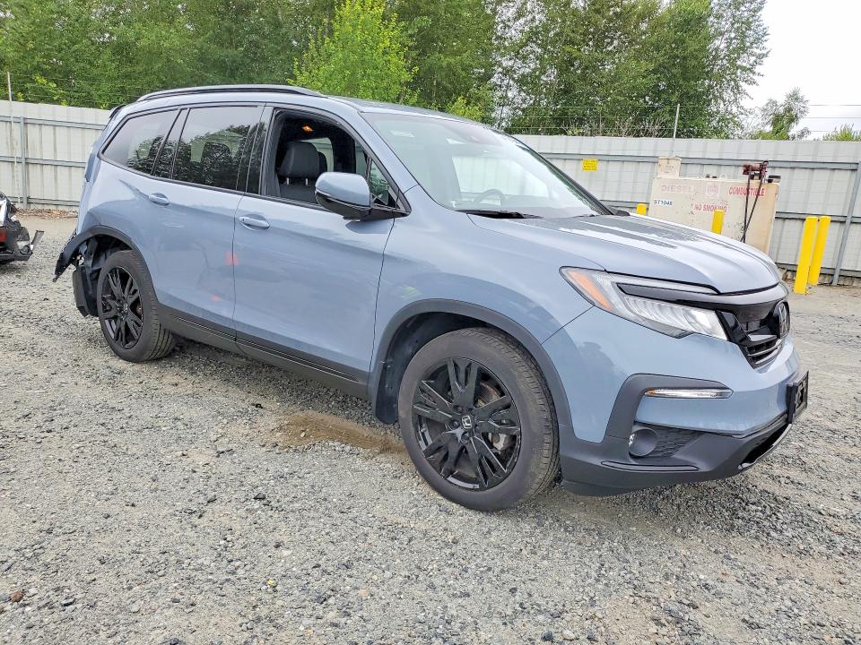 Photo 4 from auction – 2022 HONDA PILOT with VIN 5FNYF6H76NB052912