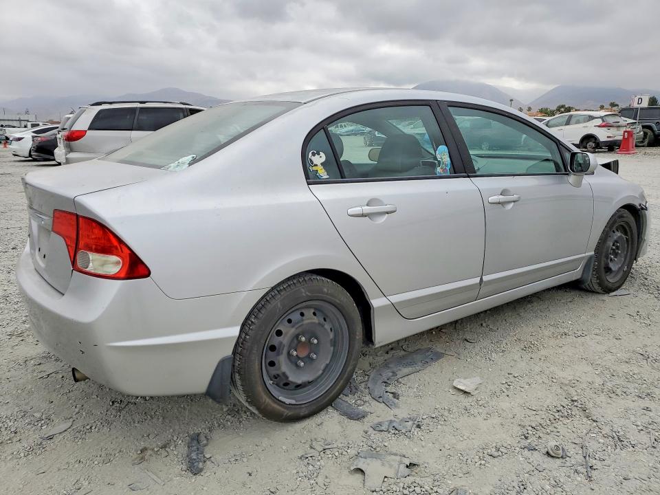 Photo 3 from auction – 2010 HONDA CIVIC with VIN 19XFA1E52AE022947