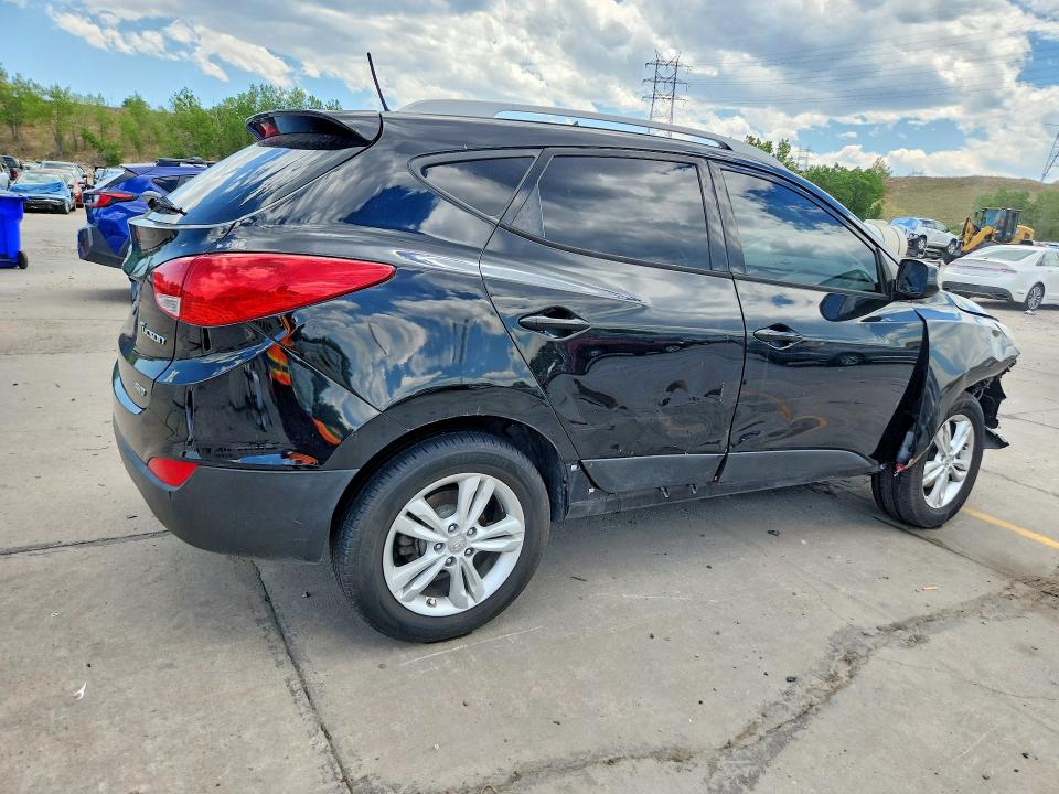 Photo 3 from auction – 2011 HYUNDAI TUCSON with VIN KM8JUCAC0BU257511