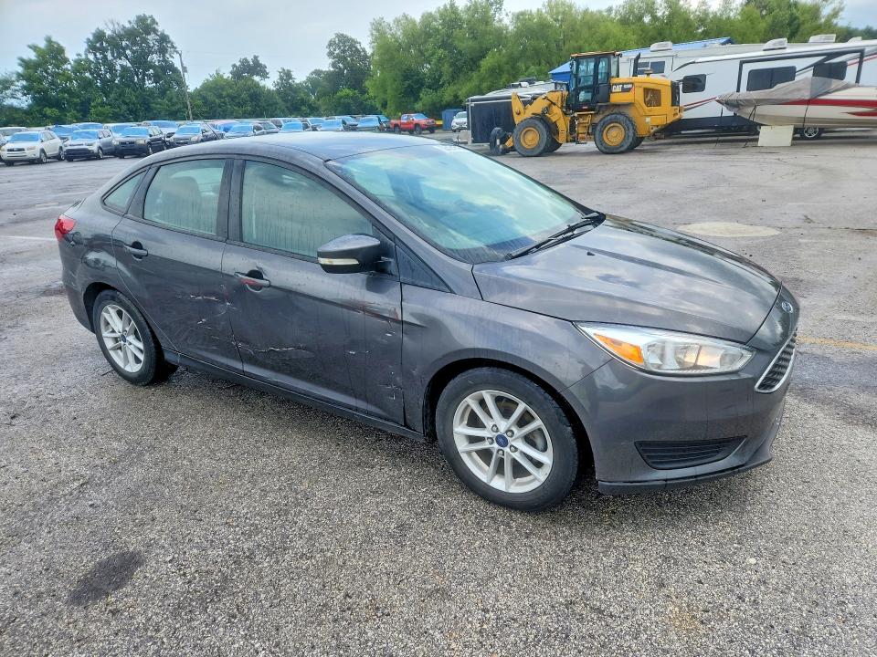 Photo 4 from auction – 2015 FORD FOCUS with VIN 1FADP3F20FL318334