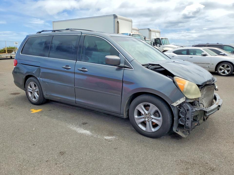 Photo 4 from auction – 2010 HONDA ODYSSEY with VIN 5FNRL3H99AB044777