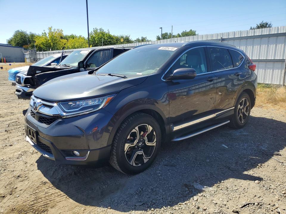 HONDA CR-V 2018 with VIN 7FARW1H90JE018049 - Photo from auction