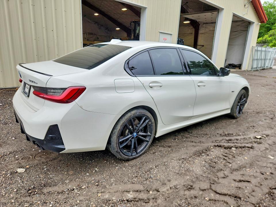 Photo 3 from auction – 2023 BMW 330XE with VIN 3MW39FS09P8D31613