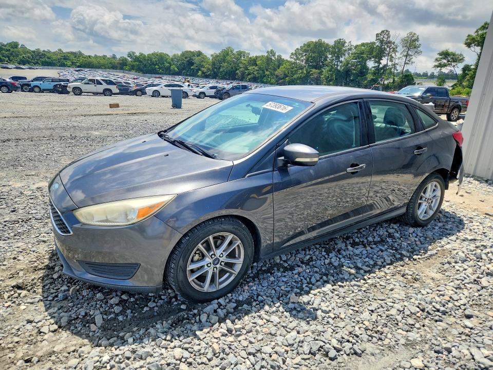 FORD FOCUS 2017 with VIN 1FADP3F2XHL305920 - Photo from auction