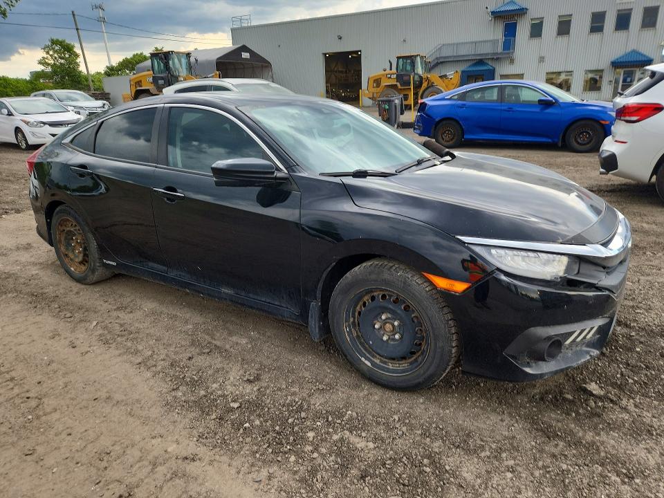 Photo 4 from auction – 2016 HONDA CIVIC with VIN 2HGFC1F47GH103621
