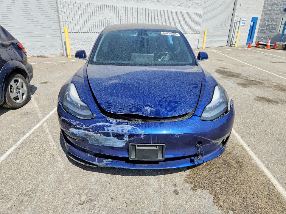 Photo 5 from auction – 2019 TESLA MODEL 3 with VIN 5YJ3E1EA9KF411844