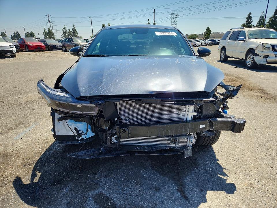 Photo 5 from auction – 2024 KIA FORTE with VIN 3KPF44AC7RE773115