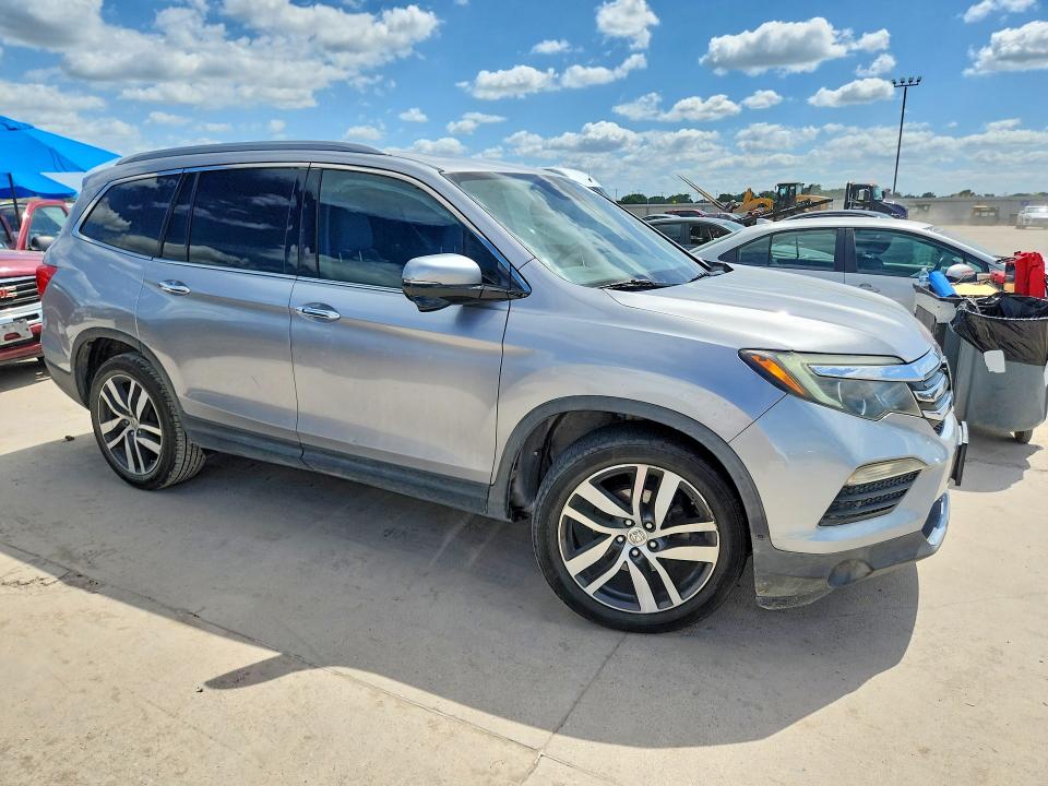 Photo 4 from auction – 2017 HONDA PILOT with VIN 5FNYF6H98HB009291