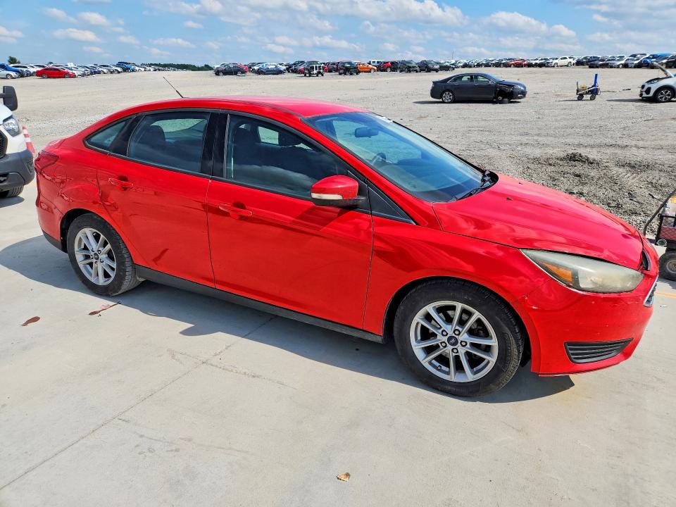 Photo 4 from auction – 2016 FORD FOCUS with VIN 1FADP3F25GL319920