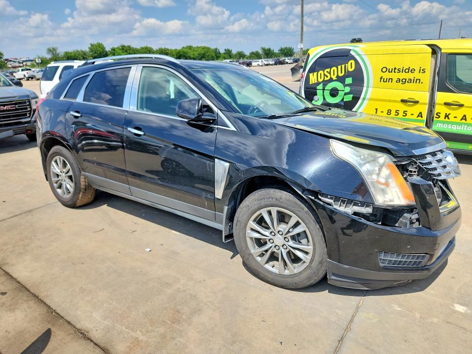 Photo 4 from auction – 2015 CADILLAC SRX with VIN 3GYFNBE32FS574752