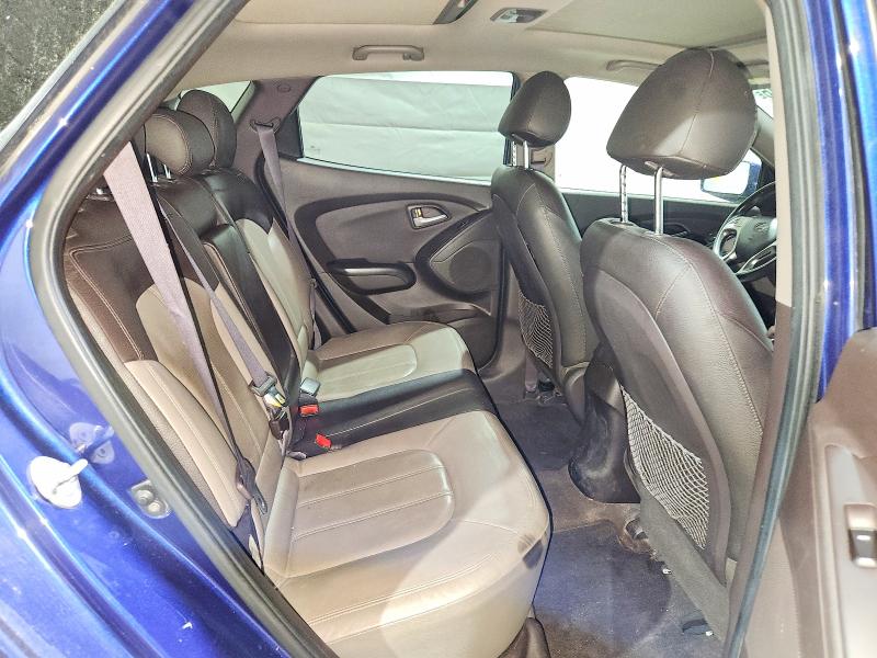 Photo 11 from auction – 2010 HYUNDAI TUCSON with VIN KM8JUCAC5AU024402