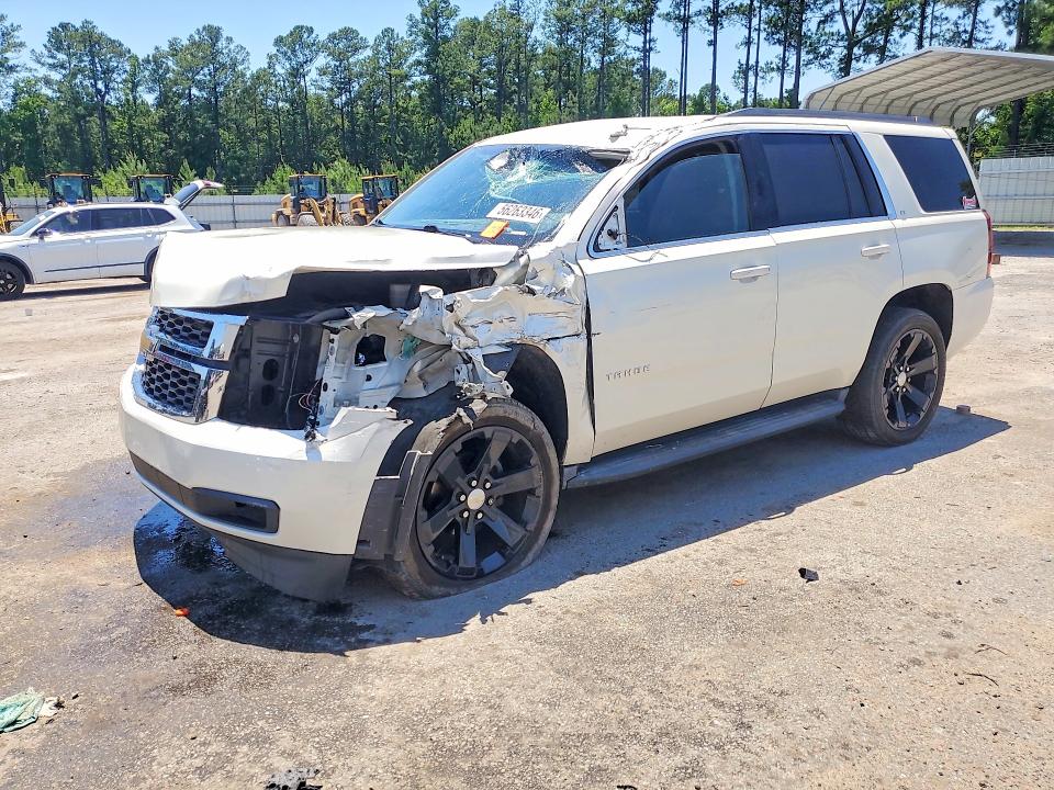 CHEVROLET TAHOE 2015 with VIN 1GNSKBKC4FR712240 - Photo from auction