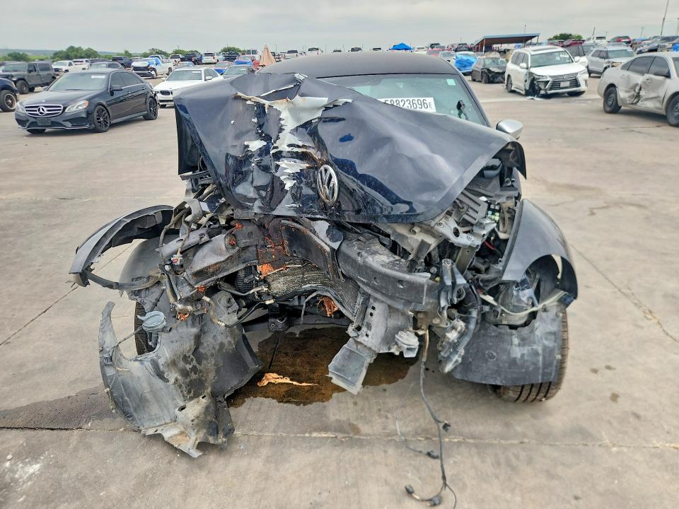 Photo 5 from auction – 2012 VOLKSWAGEN BEETLE with VIN 3VWVA7AT7CM604549