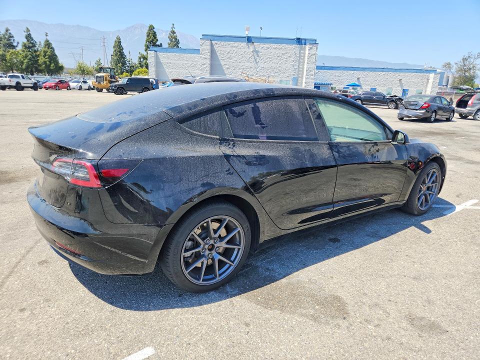 Photo 3 from auction – 2022 TESLA MODEL 3 with VIN 5YJ3E1EA7NF362471