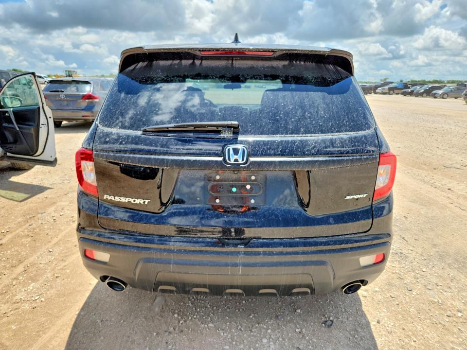 Photo 6 from auction – 2021 HONDA PASSPORT with VIN 5FNYF7H25MB004522