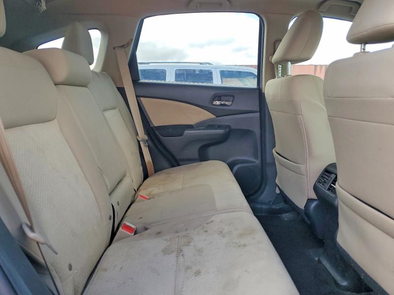 Photo 11 from auction – 2015 HONDA CR-V with VIN 3CZRM3H57FG700996