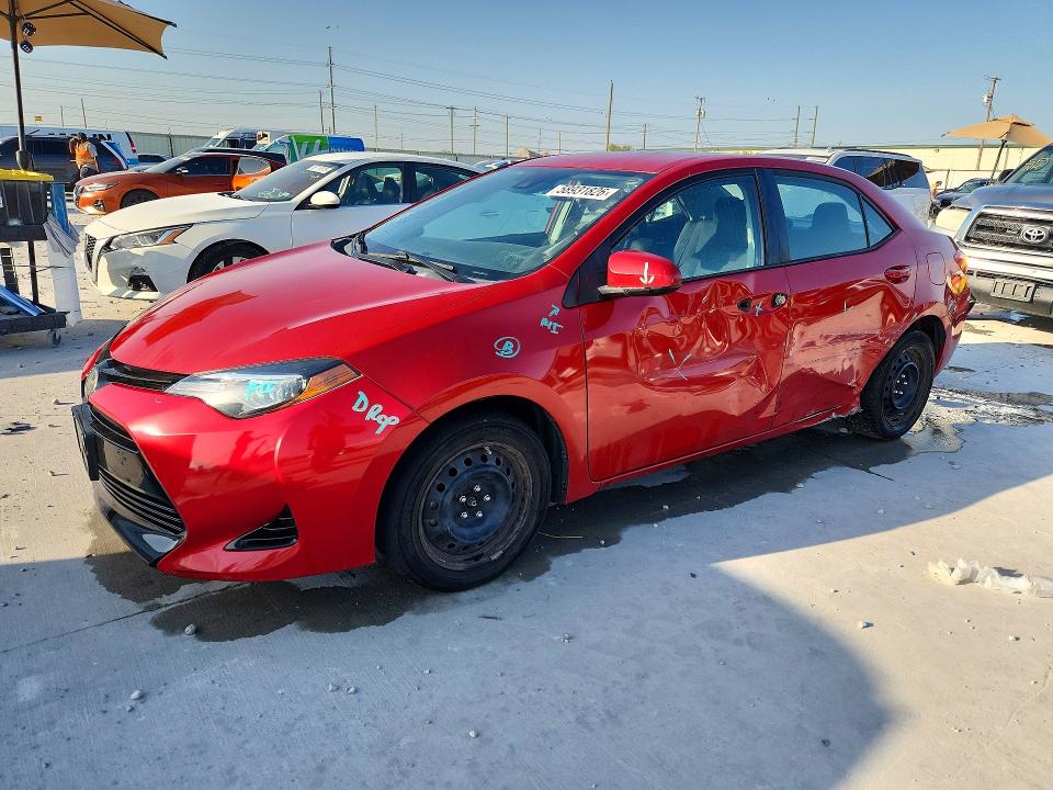 TOYOTA COROLLA 2018 with VIN 5YFBURHE0JP826467 - Photo from auction