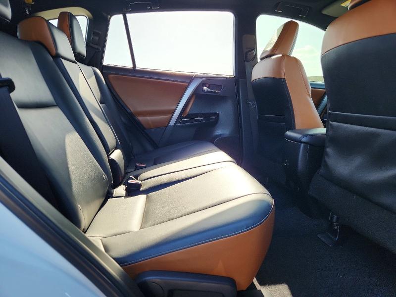Photo 11 from auction – 2018 TOYOTA RAV4 with VIN JTMNFREV7JJ154522
