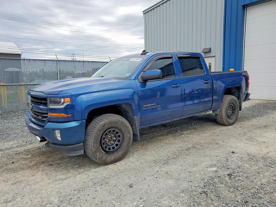 CHEVROLET SILVERADO 2017 with VIN 3GCUKREC2HG336937 - Photo from auction
