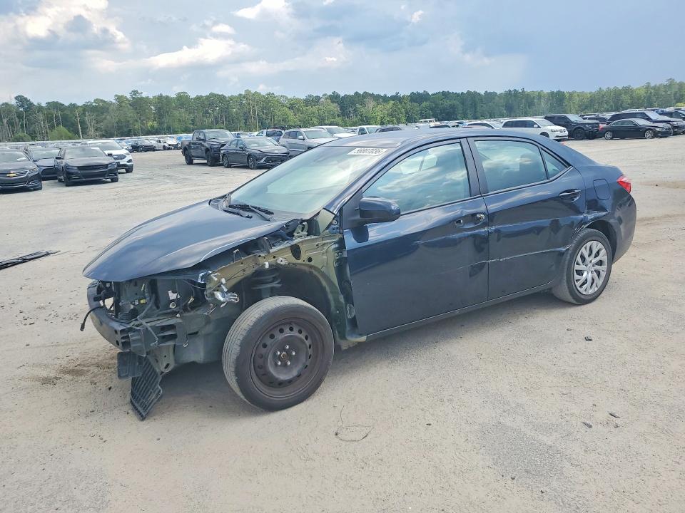 TOYOTA COROLLA 2018 with VIN 5YFBURHE8JP828600 - Photo from auction