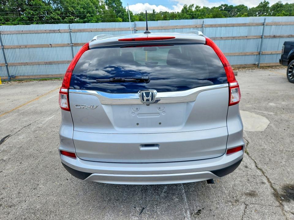 Photo 6 from auction – 2016 HONDA CR-V with VIN 2HKRM3H72GH535052