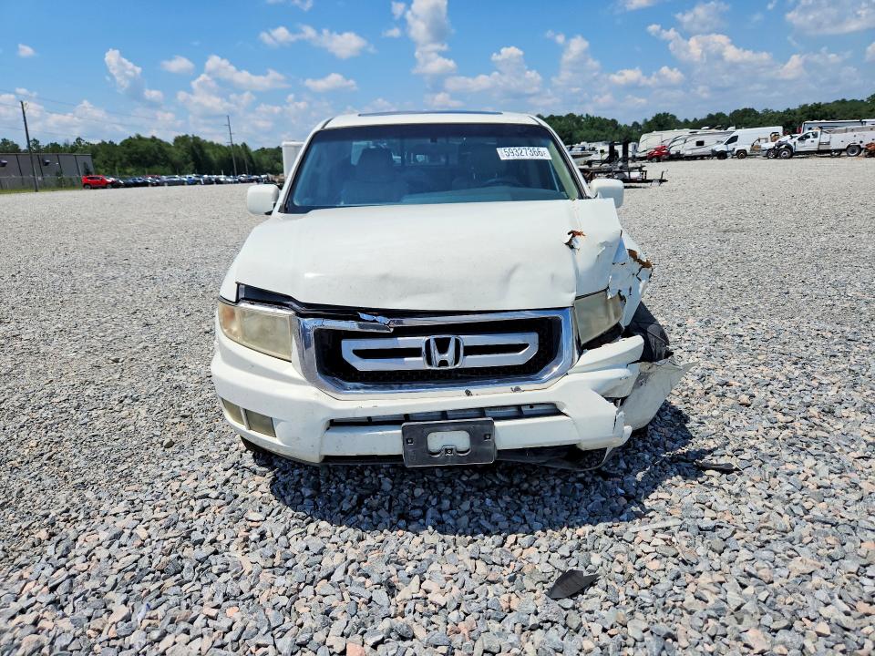 Photo 5 from auction – 2009 HONDA RIDGELINE with VIN 5FPYK16509B100935