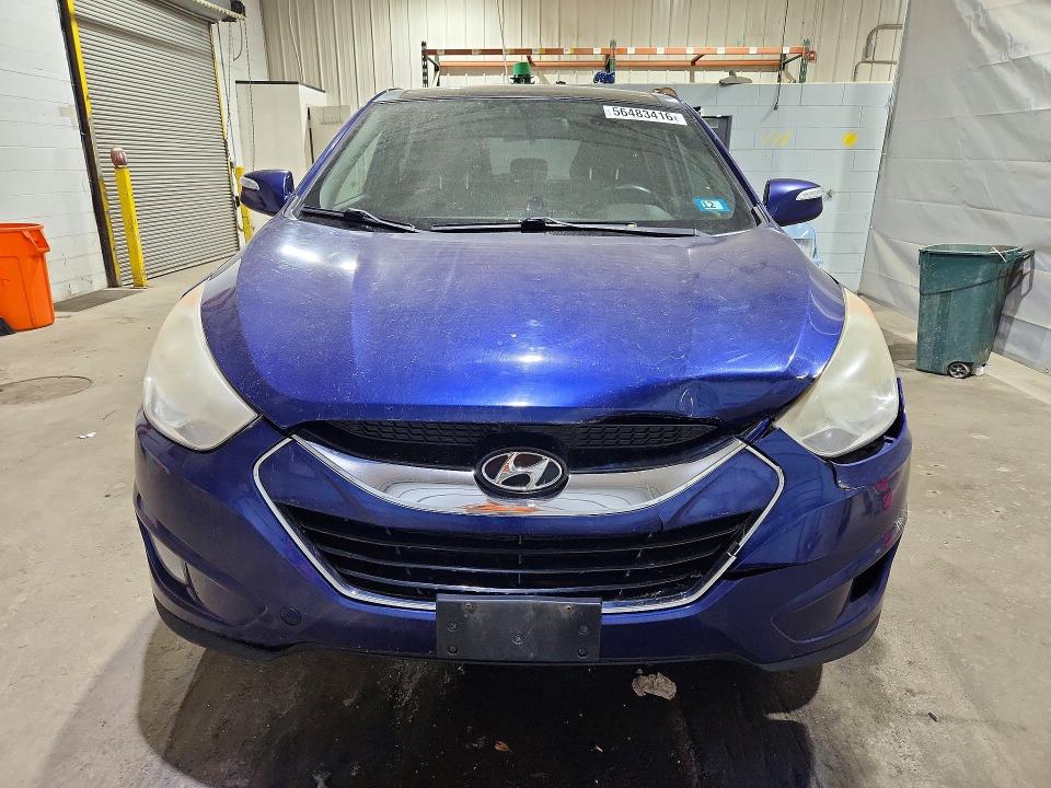 Photo 5 from auction – 2010 HYUNDAI TUCSON with VIN KM8JUCAC5AU024402