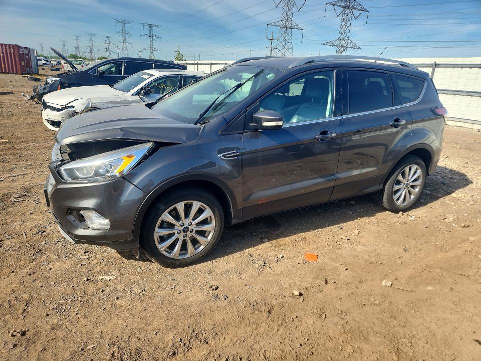 FORD ESCAPE 2017 with VIN 1FMCU9J97HUD36487 - Photo from auction