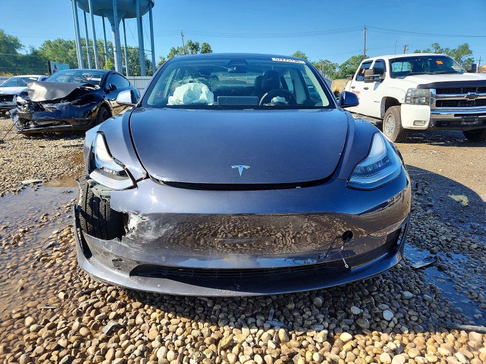 Photo 5 from auction – 2021 TESLA MODEL 3 with VIN 5YJ3E1EA9MF838492
