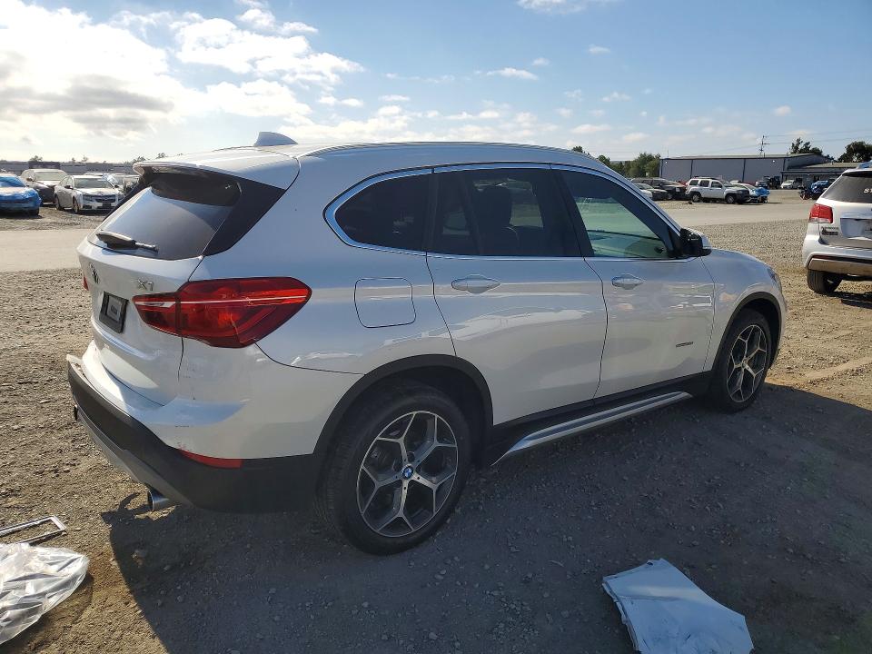Photo 3 from auction – 2018 BMW X1 with VIN WBXHU7C38J5H45062
