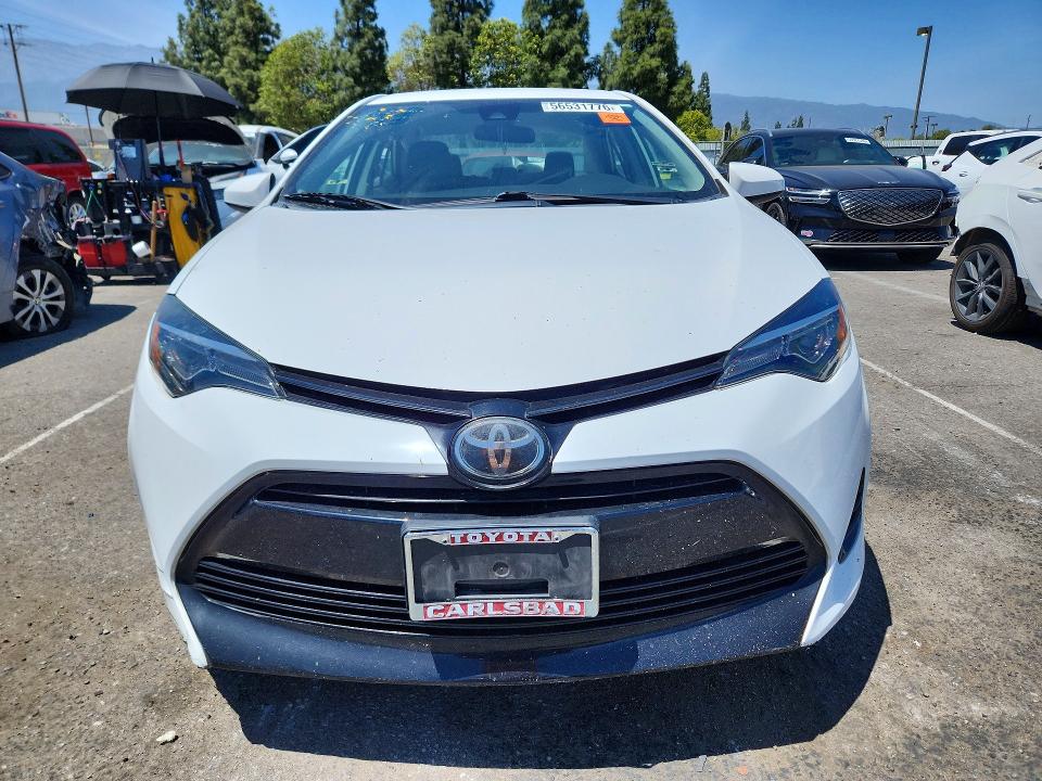 Photo 5 from auction – 2018 TOYOTA COROLLA with VIN 5YFBURHE0JP780378