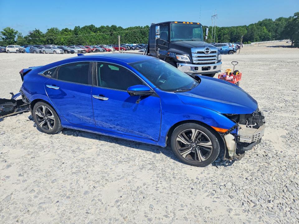Photo 4 from auction – 2016 HONDA CIVIC with VIN 2HGFC1F90GH644148