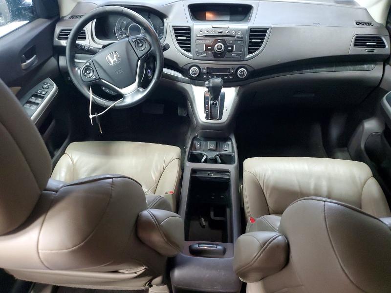 Photo 8 from auction – 2014 HONDA CR-V with VIN 2HKRM4H77EH665444
