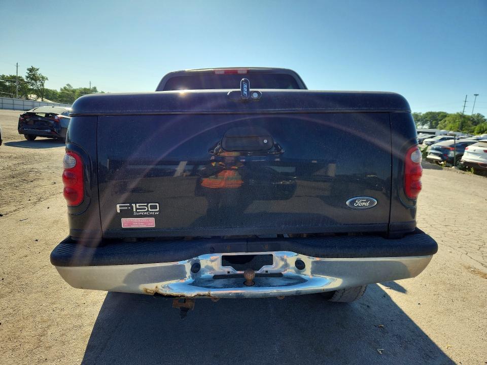 Photo 6 from auction – 2001 FORD F150 with VIN 1FTRW08WX1KF89773