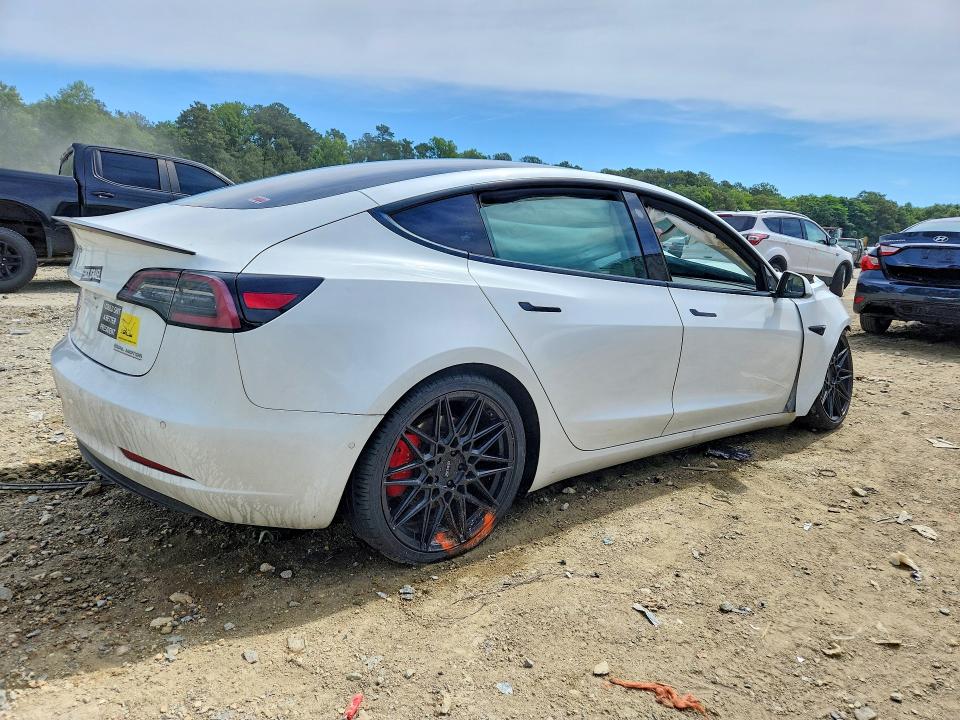 Photo 3 from auction – 2021 TESLA MODEL 3 with VIN 5YJ3E1EC4MF033243