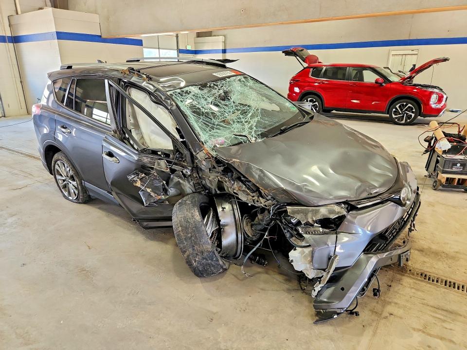 Photo 4 from auction – 2017 TOYOTA RAV4 with VIN JTMDFREV2HD215764