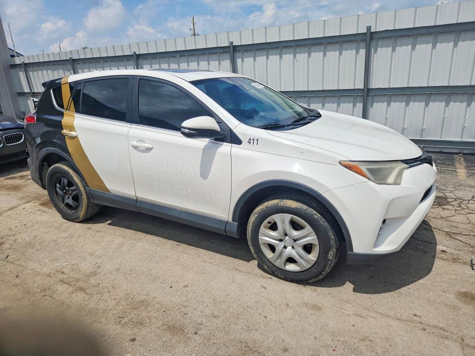 Photo 4 from auction – 2018 TOYOTA RAV4 with VIN 2T3RFREV2JW701411