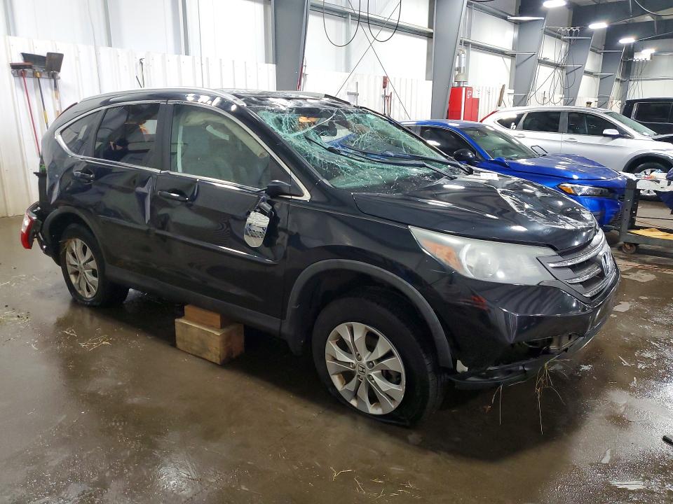 Photo 4 from auction – 2014 HONDA CR-V with VIN 5J6RM4H72EL071561