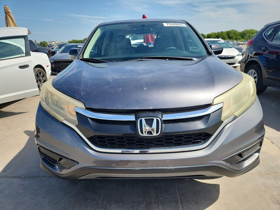 Photo 5 from auction – 2015 HONDA CR-V with VIN 3CZRM3H36FG710465